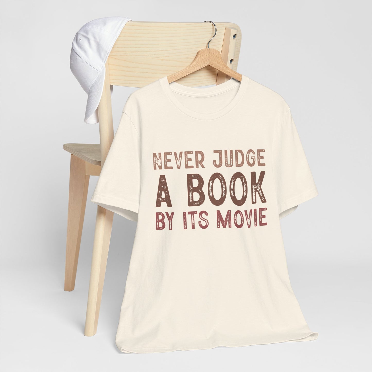 Never Judge a Book by Its Movie T-Shirt – A Must-Have for Book Lovers!